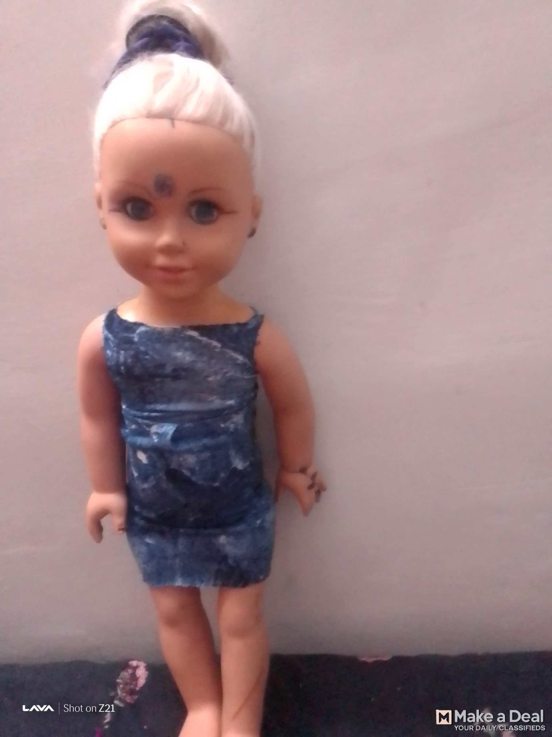 It’s a tall height big plastic doll